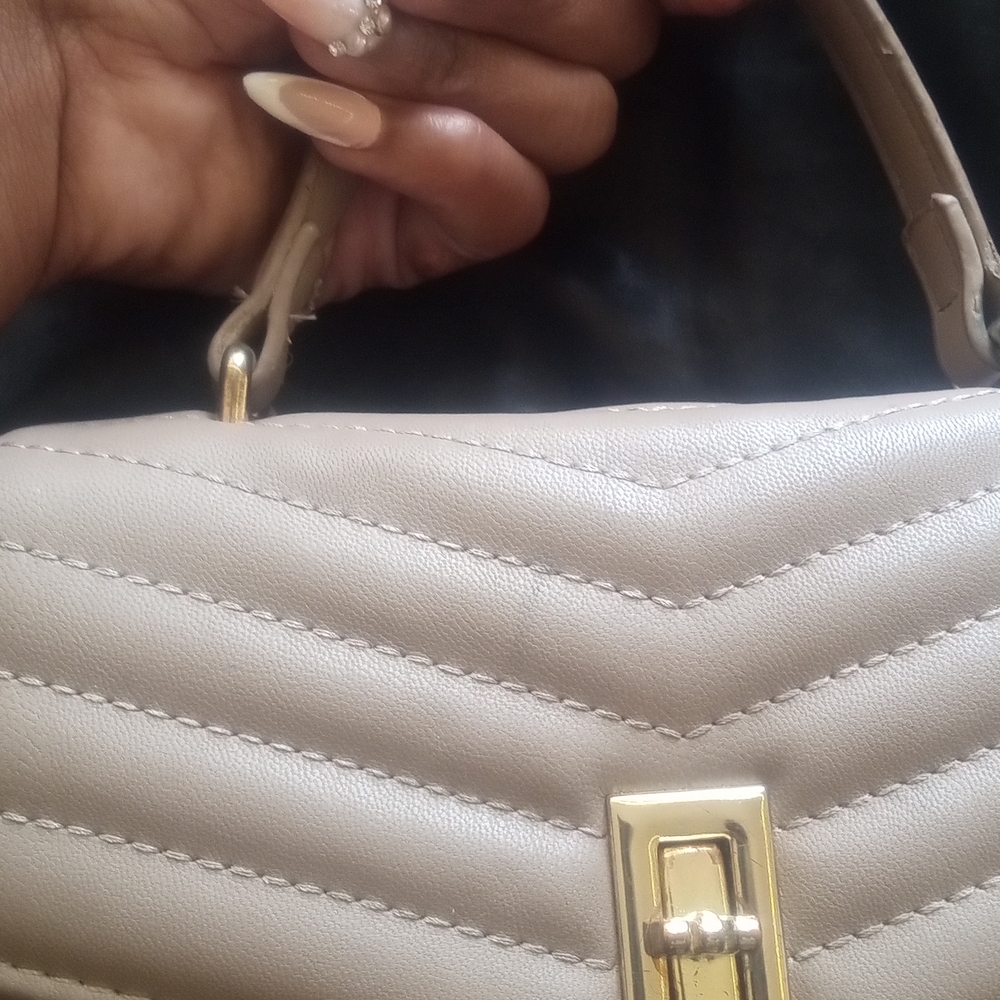 Elegant Cream Quilted Handbag